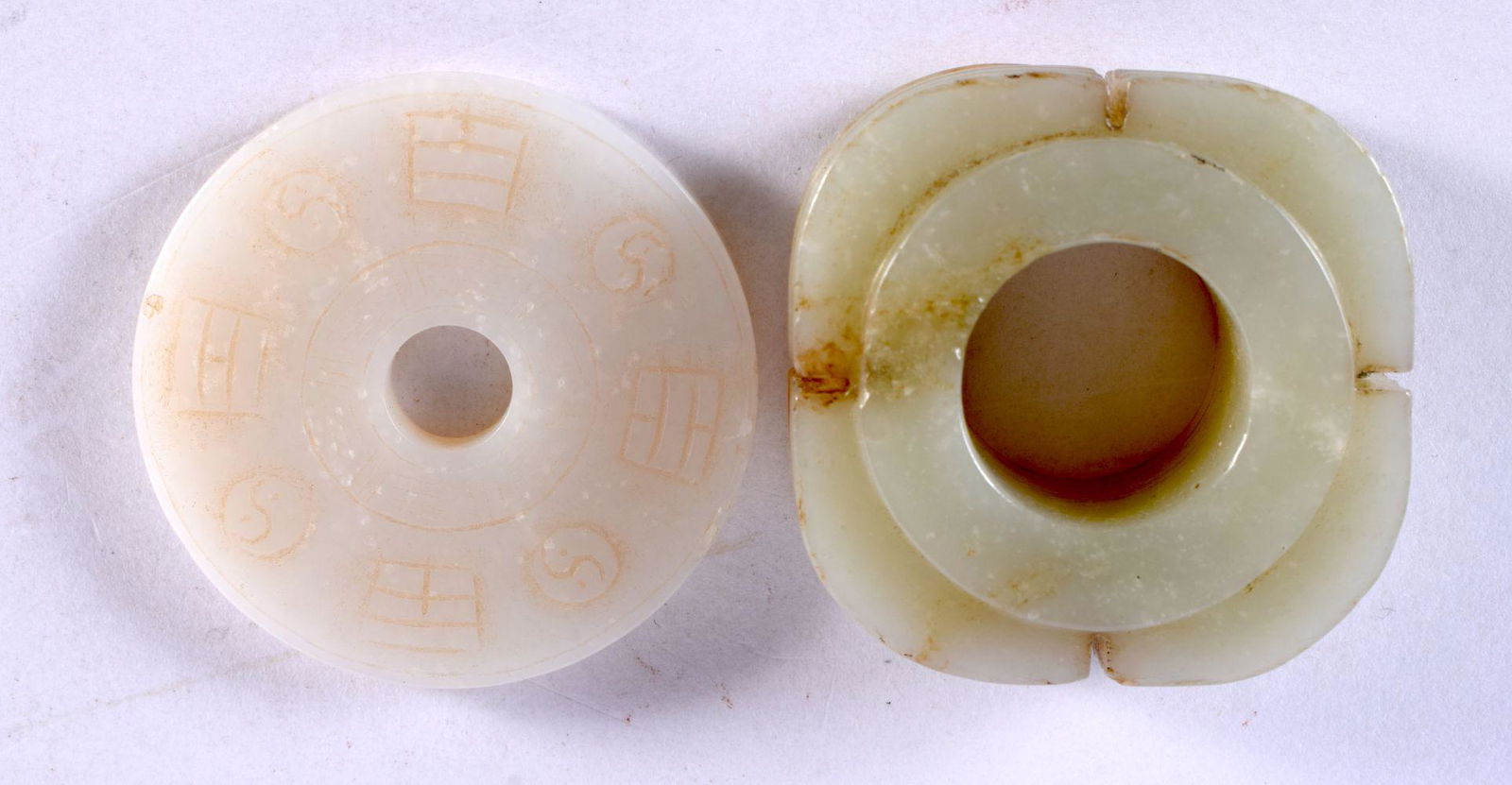 TWO CHINESE JADE TOGGLES. 5.5 cm wide. (2) (1 of 2)