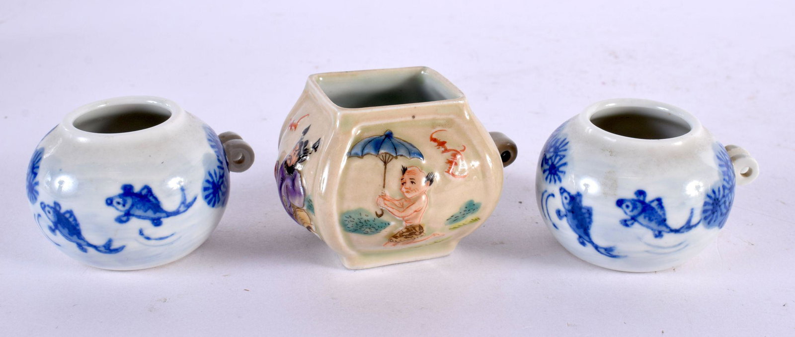 THREE CHINESE PORCELAIN BIRD FEEDERS 20th Century. Largest 5 cm wide. (3): THREE CHINESE PORCELAIN BIRD FEEDERS 20th Century. Largest 5 cm wide. (3)