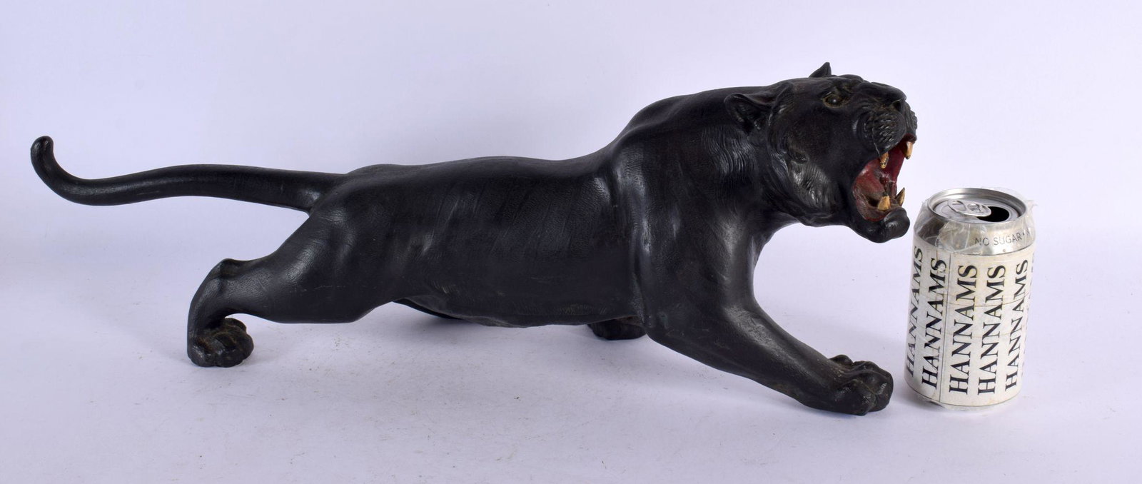 A LARGE 19TH CENTURY JAPANESE MEIJI PERIOD SPELTER TIGER modelled scowling. 50 cm x 20 cm.: A LARGE 19TH CENTURY JAPANESE MEIJI PERIOD SPELTER TIGER modelled scowling. 50 cm x 20 cm.