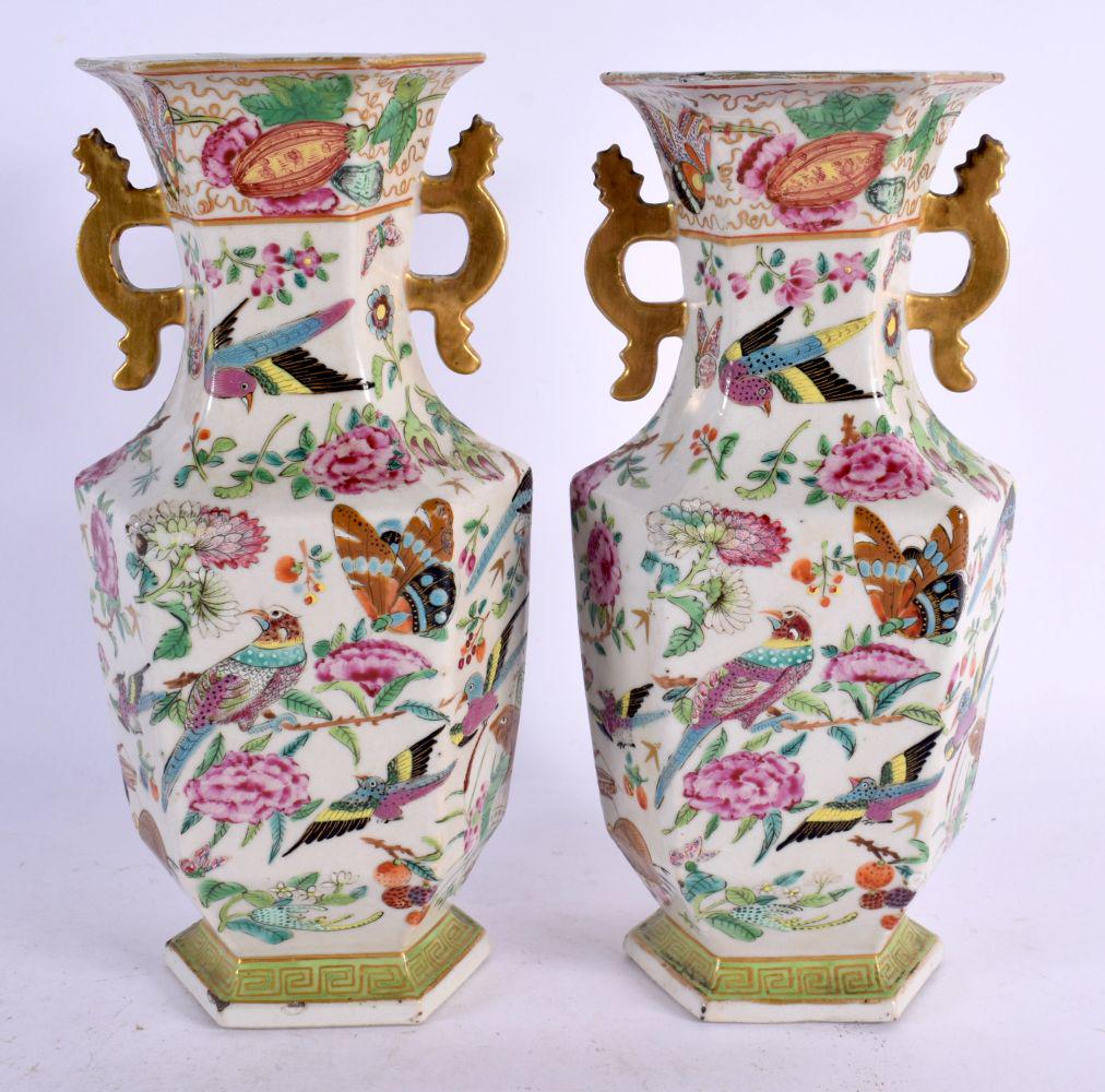 A PAIR OF 19TH CENTURY CHINESE CANTON FAMILLE ROSE VASES painted with birds. 23 cm x 8 cm. (1 of 5)