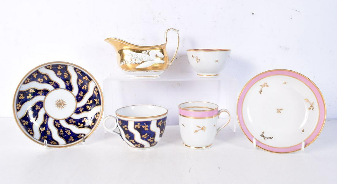 TWO 18TH CENTURY ENGLISH PORCELAIN TEABOWLS AND SAUCERS together with an unusual gilt decorated crea (1 of 2)