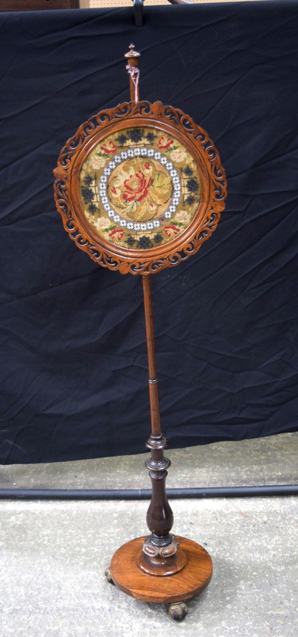 A Victorian carved wood pole screen  140 x 38 cm . (1 of 4)