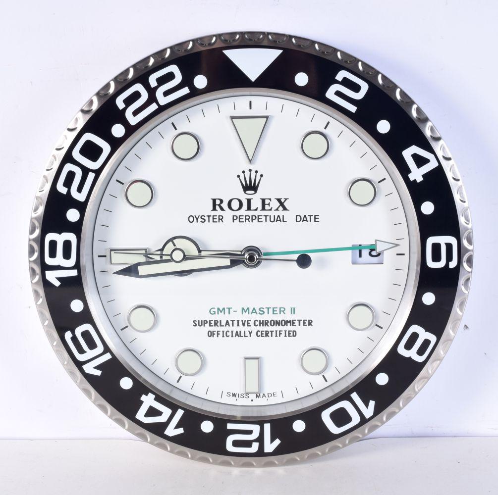 A Contemporary Rolex dealership style wall clock 34 cm.: A Contemporary Rolex dealership style wall clock 34 cm.