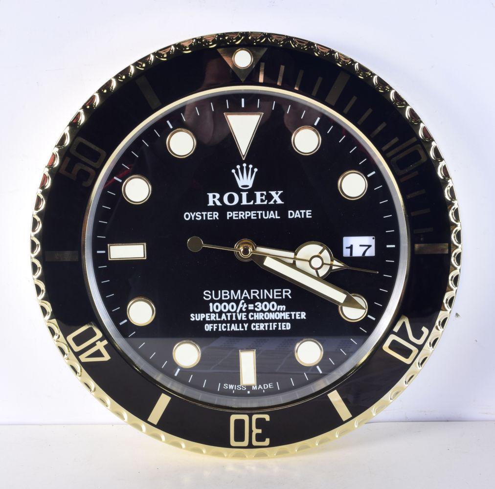 A Contemporary Rolex dealership style wall clock 34 cm.: A Contemporary Rolex dealership style wall clock 34 cm.