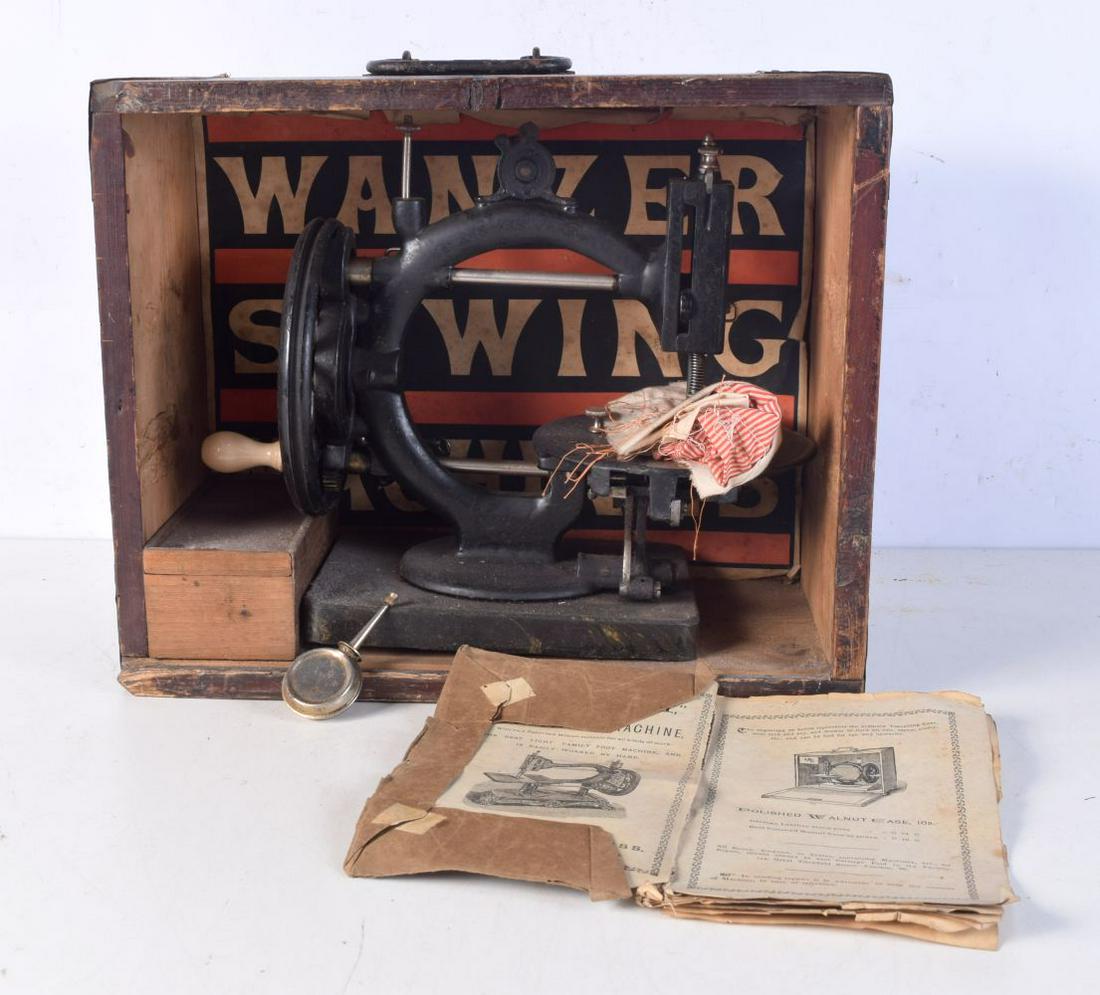 A cased Wanzer Sewing machine 31 x 38 x 19 cm: A cased Wanzer Sewing machine 31 x 38 x 19 cm