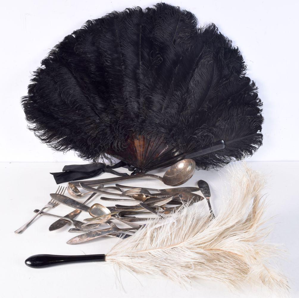 A collection of plated flatware, together with a tortoiseshell effect feather fan and a feather dust (1 of 4)