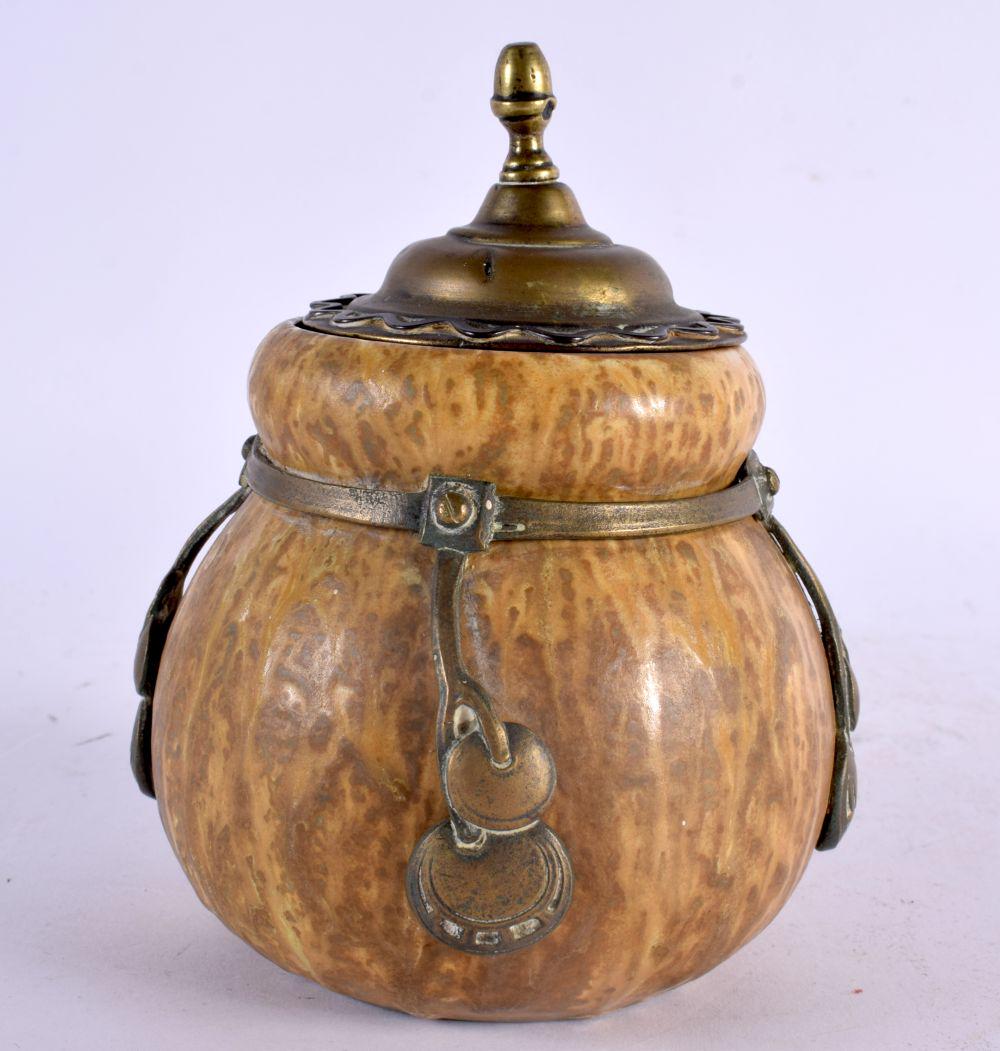 AN AUSTRIAN SECCIONIST MOVEMENT POTTERY BARREL AND COVER overlaid with gilt metal motifs. 15 cm x 9 (1 of 4)