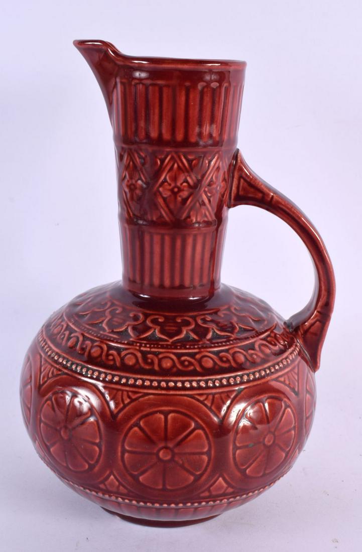 AN ARTS AND CRAFTS RED POTTERY JUG Attributed to Dr Christopher Dresser. 25 cm x 13 cm. (1 of 6)