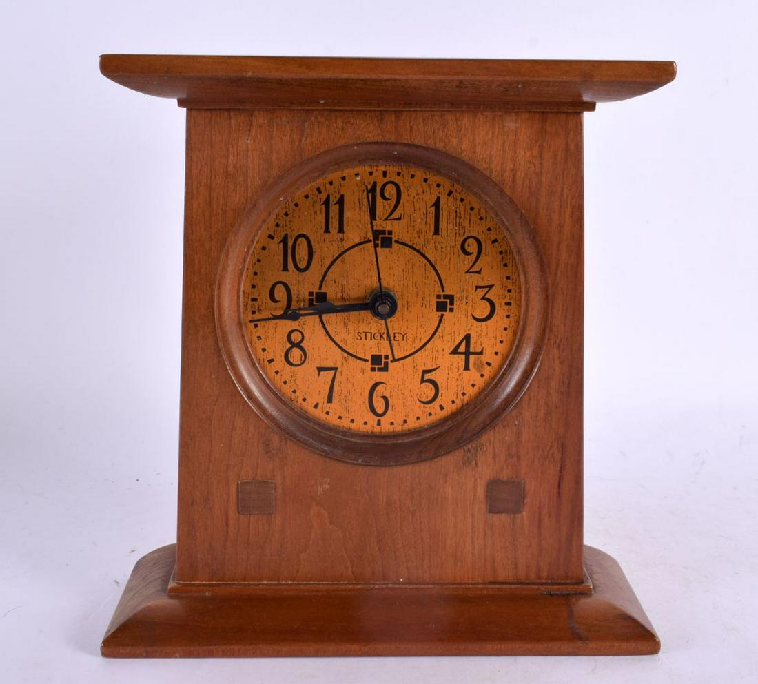 A STYLISH STICKLEY CARVED WOOD MANTEL CLOCK modelled in the Arts and Crafts manner. 23 cm x 18 cm. (1 of 4)