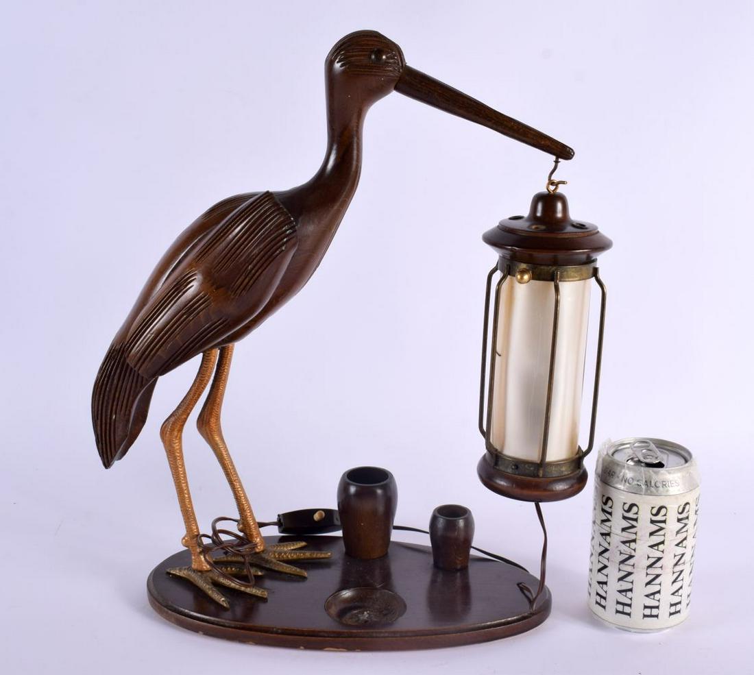 AN ART DECO CARVED WOOD KIWI BIRD DESK LANTERN. 38 cm x 28 cm.: AN ART DECO CARVED WOOD KIWI BIRD DESK LANTERN. 38 cm x 28 cm.