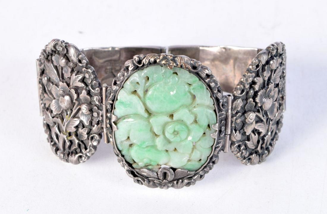A 19TH CENTURY CHINESE SILVER AND JADE BRACELET. 37.3 grams. 6 cm wide internal width. (1 of 3)
