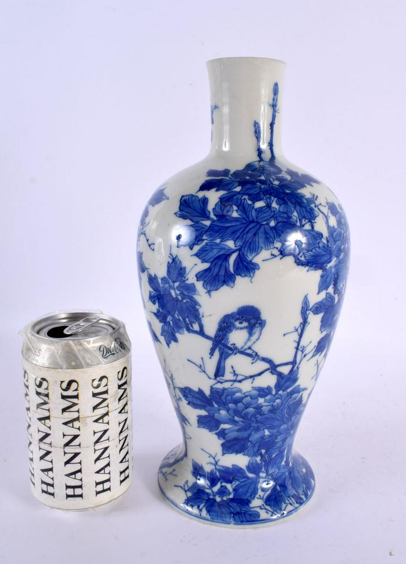 A 19TH CENTURY JAPANESE MEIJI PERIOD BLUE AND WHITE VASE painted with birds. 28 cm high.: A 19TH CENTURY JAPANESE MEIJI PERIOD BLUE AND WHITE VASE painted with birds. 28 cm high.