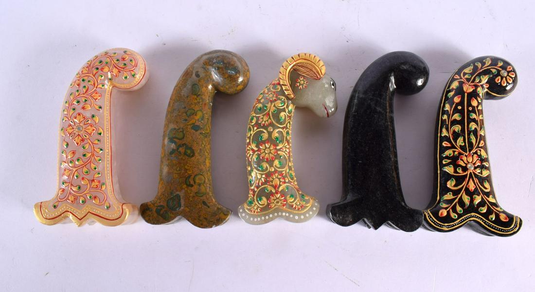 FIVE MIDDLE EASTERN CARVED HARDSTONE PERSIAN INDIAN DAGGER HANDLES three overlaid with lacquered fol (1 of 2)