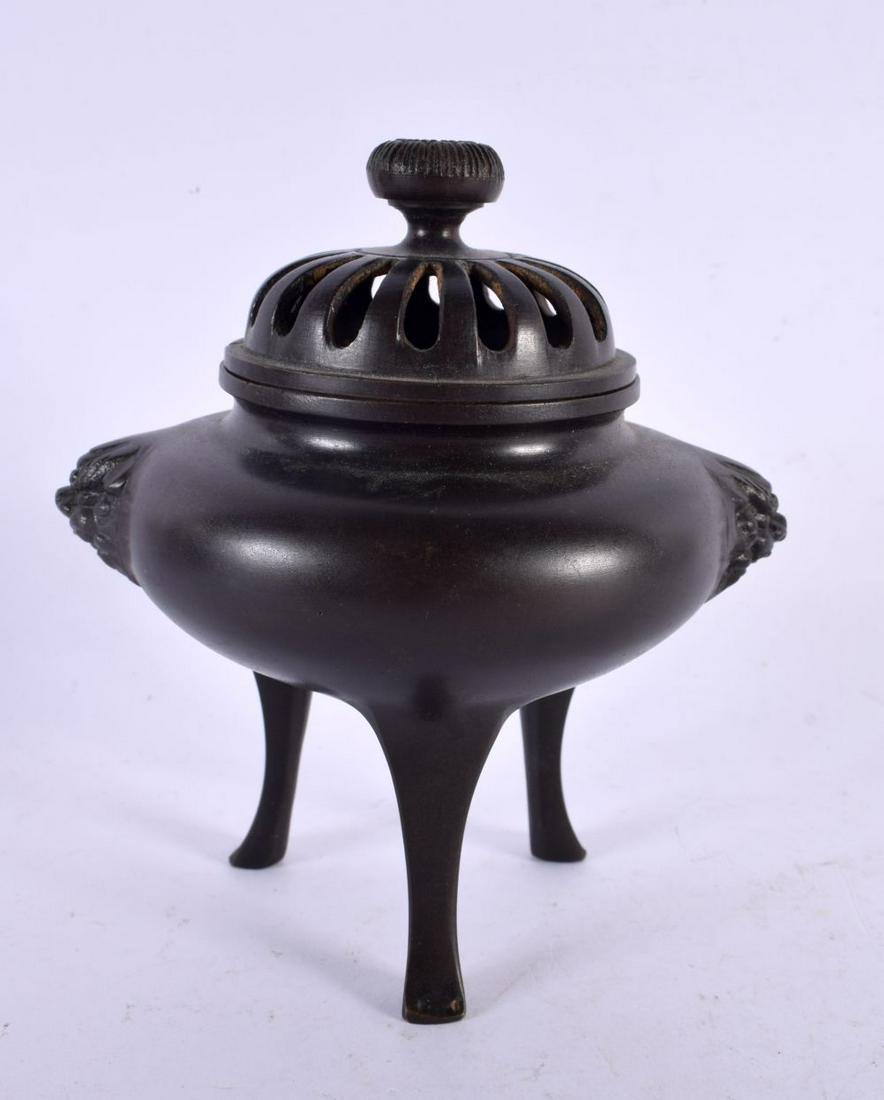 A 19TH CENTURY JAPANESE MEIJI PERIOD BRONZE CENSER AND COVER with buddhistic lion finials. 13 cm x 9: A 19TH CENTURY JAPANESE MEIJI PERIOD BRONZE CENSER AND COVER with buddhistic lion finials. 13 cm x 9 cm.