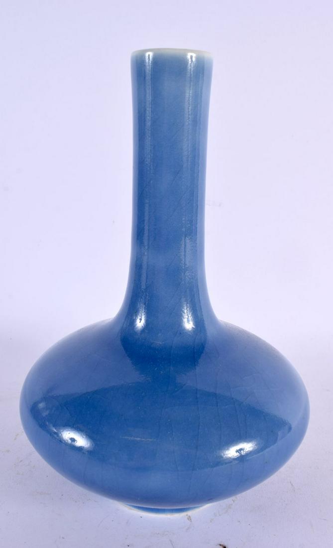 A CHINESE LAVENDER GLAZED BOTTLE NECK PORCELAIN VASE probably 19th century, bearing Kangxi marks to (1 of 4)