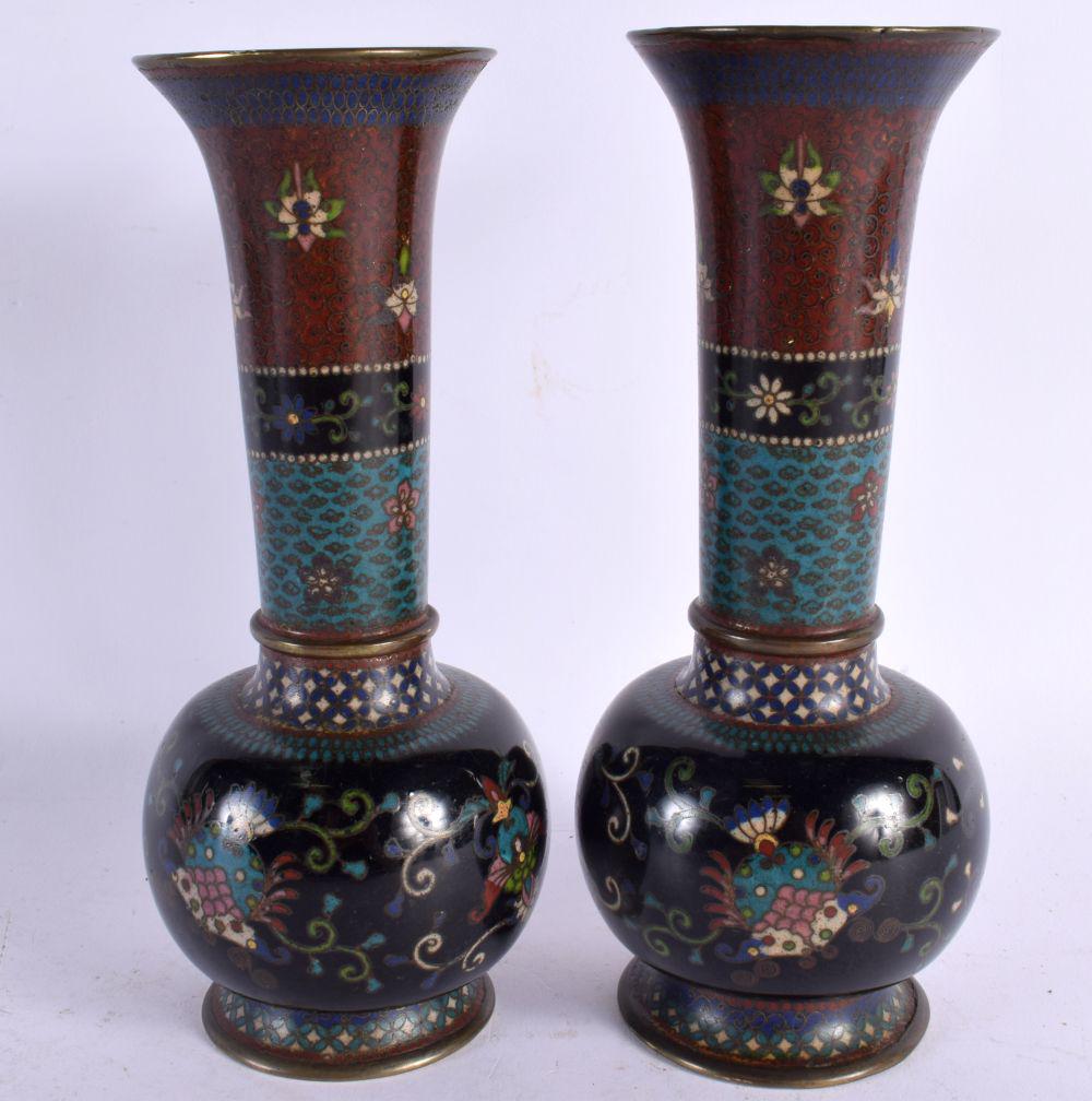 AN UNUSUAL PAIR OF 19TH CENTURY JAPANESE MEIJI PERIOD CLOISONNE ENAMEL VASES decorated with foliage (1 of 4)