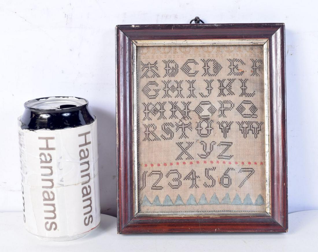A 19th century framed sampler. 15 x 11cm.: A 19th century framed sampler. 15 x 11cm.