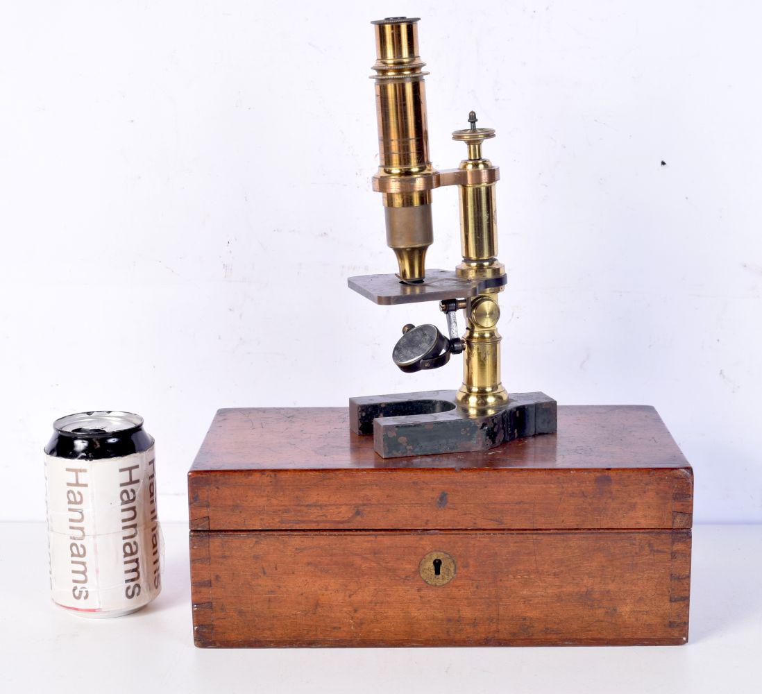 A boxed antique microscope. 23cm high. (1 of 3)