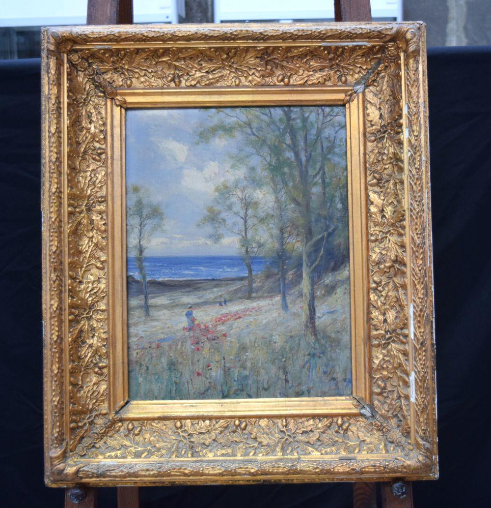 A framed oil on canvas depicting a poppy field in the style of L Richards A.K.A Francis E Jamieson (: A framed oil on canvas depicting a poppy field in the style of L Richards A.K.A Francis E Jamieson (1895-1950). 44 x 33cm.