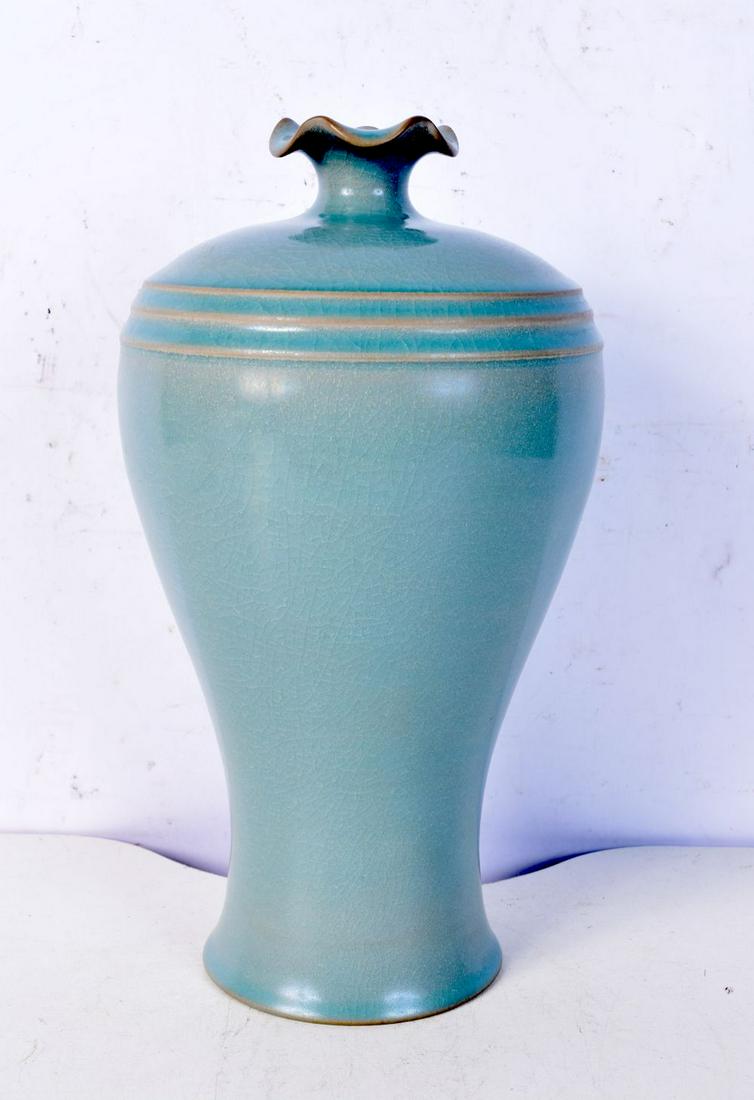 A Chinese porcelain Ru ware vase with petal shaped rim. 25cm. (1 of 5)