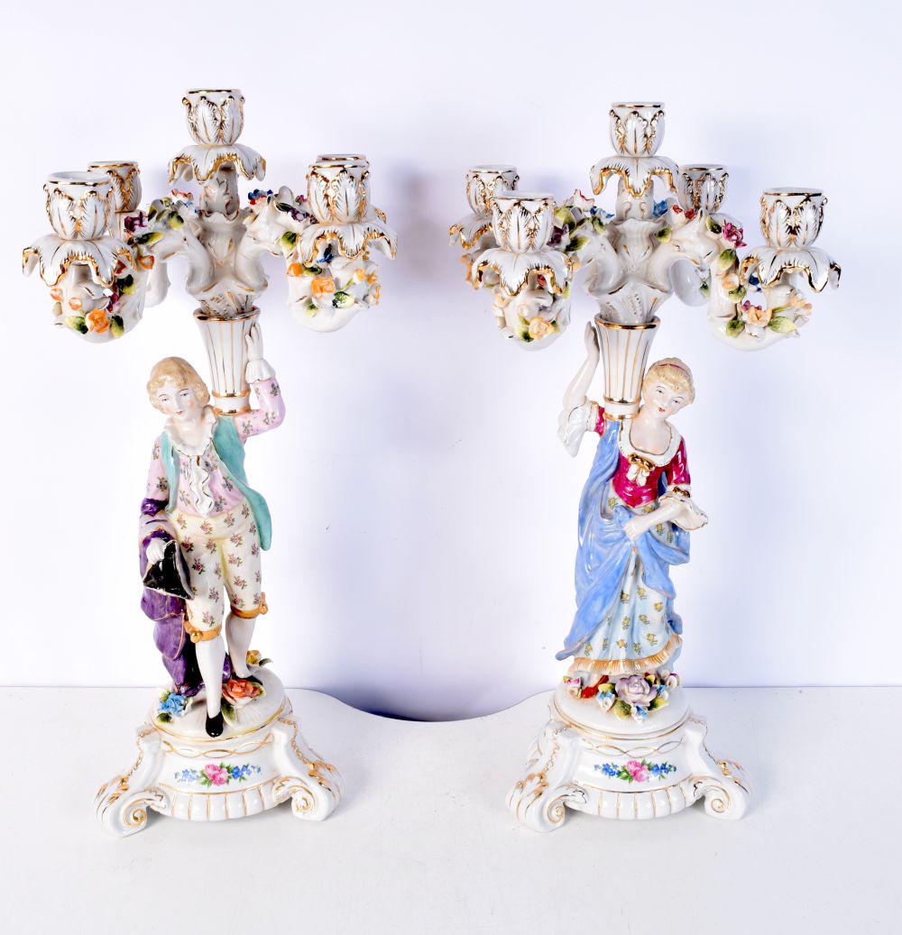 A pair of Continental figural porcelain candlesticks 47 cm (2). (1 of 5)