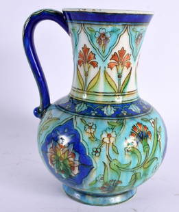 A LOVELY 19TH CENTURY FRENCH ART NOUVEAU POTTERY JUG by Theodore Deck, painted with organic scrollin: A LOVELY 19TH CENTURY FRENCH ART NOUVEAU POTTERY JUG by Theodore Deck, painted with organic scrolling foliage, modelled in the 16th Century Ottoman style. 19 cm x 10 cm. Note: Joseph-Théodore Deck (2