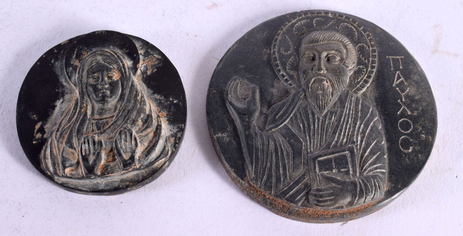 TWO 18TH CENTURY GREEK CARVED STONE CIRCULAR ROUNDELS one depicting a standing scholar flanked by a (1 of 4)