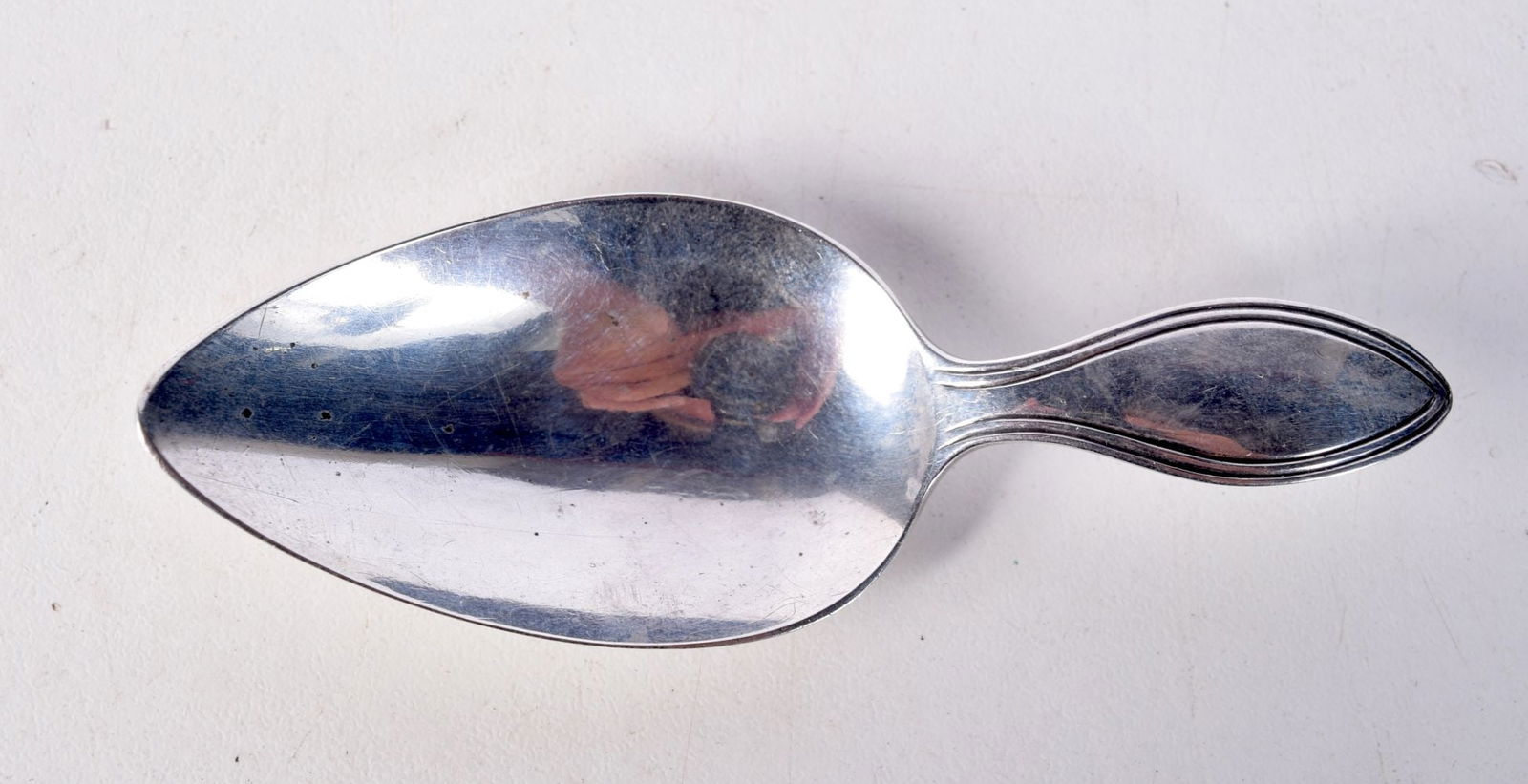 A DUTCH SILVER CADDY SPOON BY JAN VAN DE BROEK.  Dated 1830.  8.3cm x 2.9cm, weight 9.2g (1 of 3)