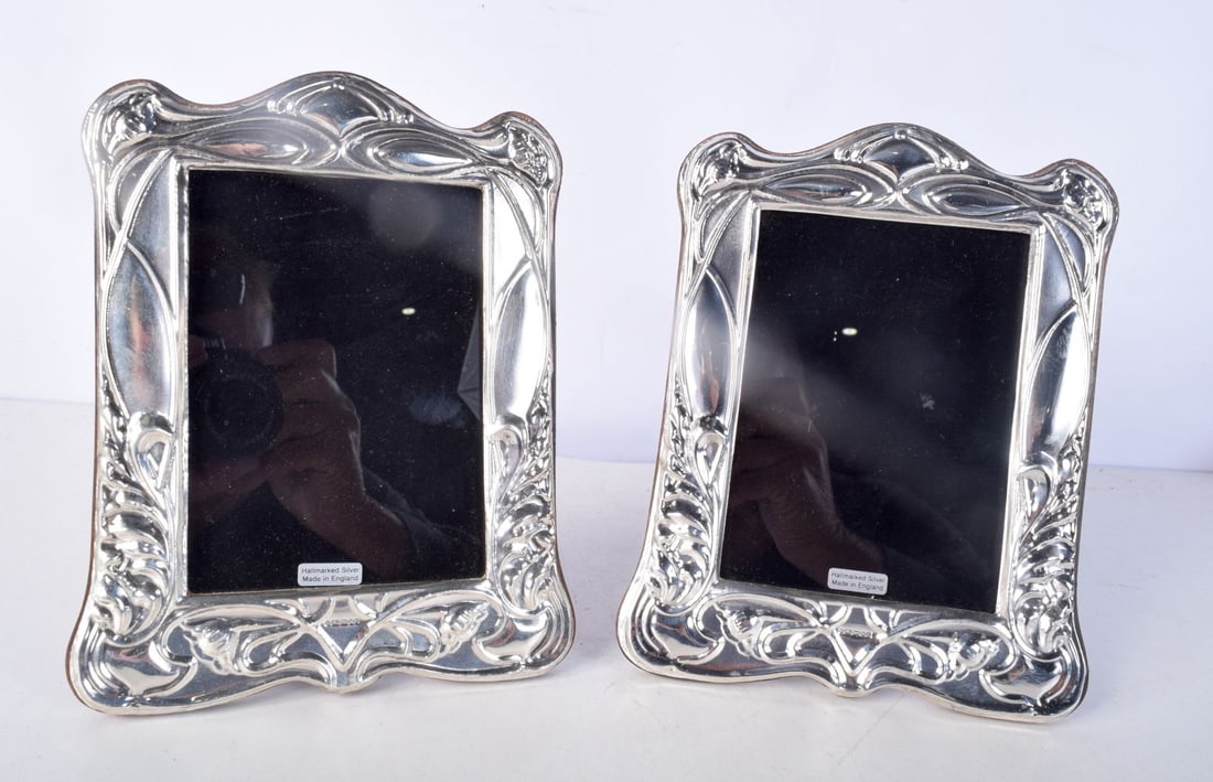 A PAIR OF SILVER PHOTO FRAMES.  Hallmarked London 2022 & 2023, 20cm x 15.5cm (2) (1 of 3)