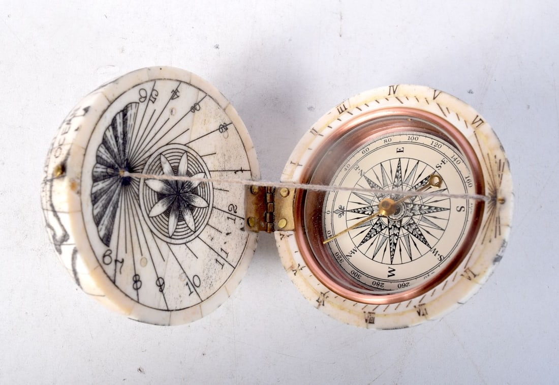 A BONE COMPASS IN THE FORM OF A GLOBE. 6.2cm diameter: A BONE COMPASS IN THE FORM OF A GLOBE. 6.2cm diameter