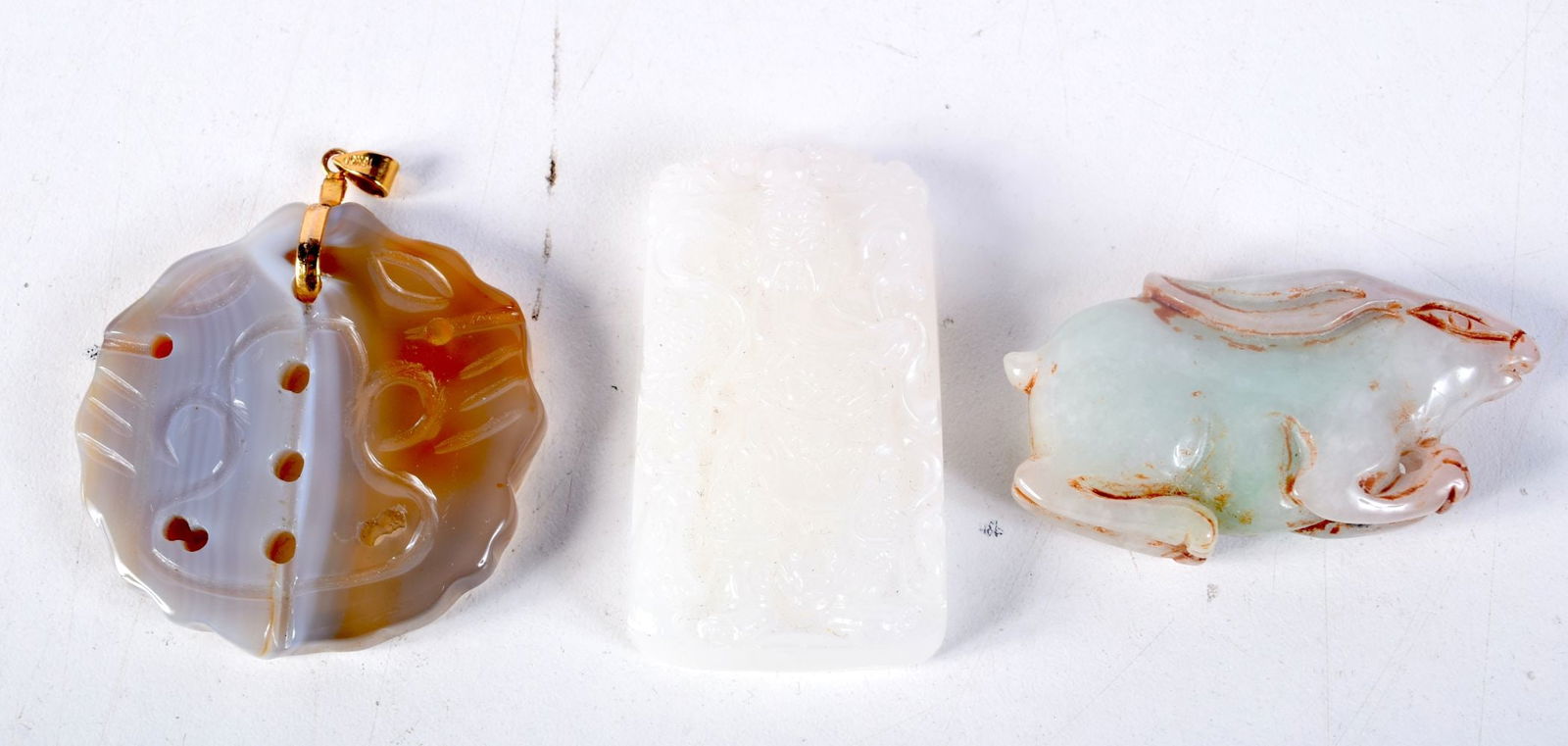 CHINESE AGATE AND JADE PLAQUES. 85.6 grams. Largest 4.5 cm wide. (3) (1 of 2)