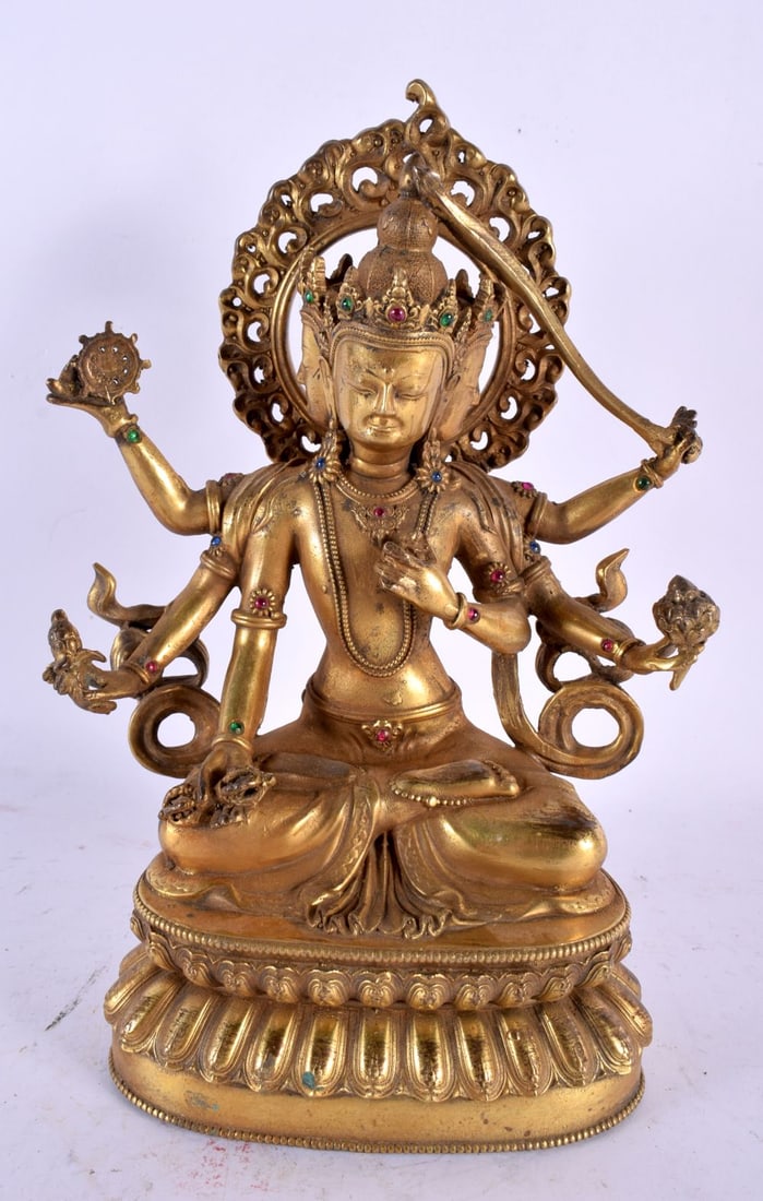 A CHINESE TIBETAN JEWELLED GILT BRONZE MULTI ARMED BRONZE BUDDHA 20th Century. 25 cm x 13 cm. (1 of 7)