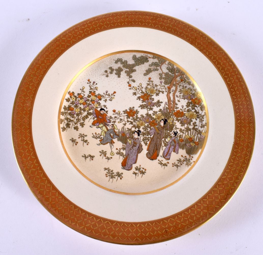 A LATE 19TH CENTURY JAPANESE MEIJI PERIOD SATSUMA PLATE painted with geisha in landscapes. 18 cm dia: A LATE 19TH CENTURY JAPANESE MEIJI PERIOD SATSUMA PLATE painted with geisha in landscapes. 18 cm diameter.