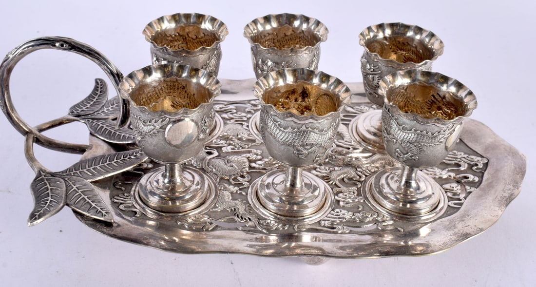 AN UNUSUAL SET OF LATE 19TH CENTURY CHINESE EXPORT SILVER CUPS ON STAND by Luen Wo, decorated with d (1 of 6)