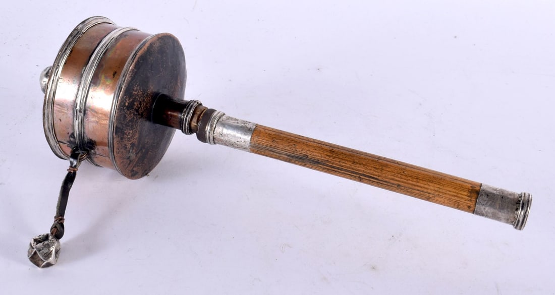 A 19TH CENTURY TIBETAN MIXED METAL COPPER AND SILVER PRAYER WHEEL. 26 cm long. (1 of 3)