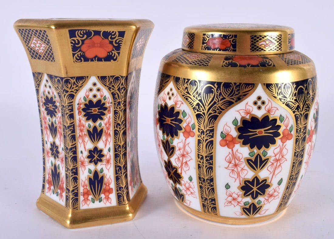 A ROYAL CROWN DERBY IMARI 1128 TEA CADDY AND COVER together with a similar vase. 11cm high. (2) (1 of 4)