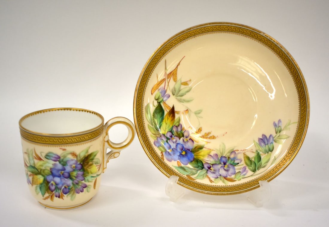 Royal Worcester coffee cup and saucer painted with violets by David Bates date mark for 1881. sauce: Royal Worcester coffee cup and saucer painted with violets by David Bates date mark for 1881. saucer 14cm wide