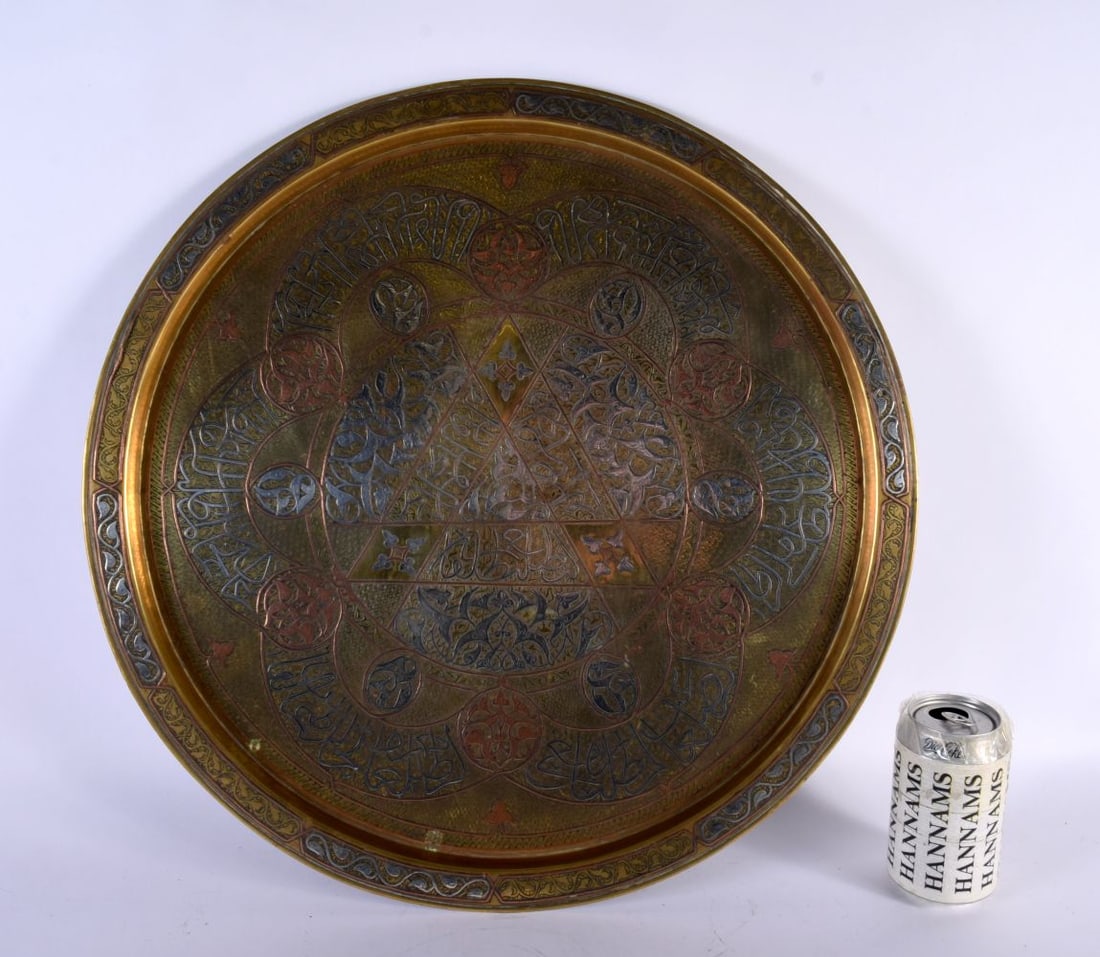 A 19TH CENTURY MIDDLE EASTERN CAIRO WARE SILVER PLATED BRASS TRAY decorated with figures. 50 cm diam (1 of 4)