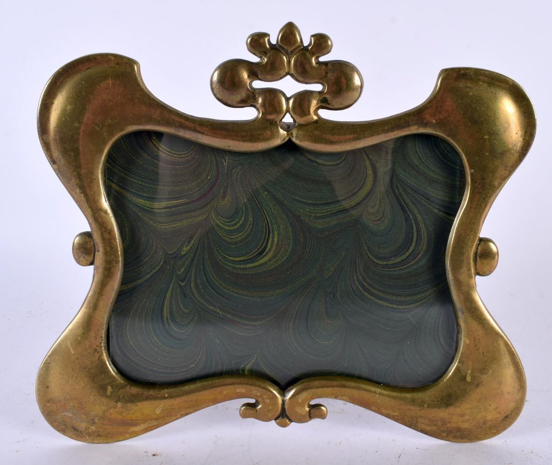 AN ART NOUVEAU BRASS PHOTOGRAPH FRAME. 17 cm x 17 cm. (1 of 4)