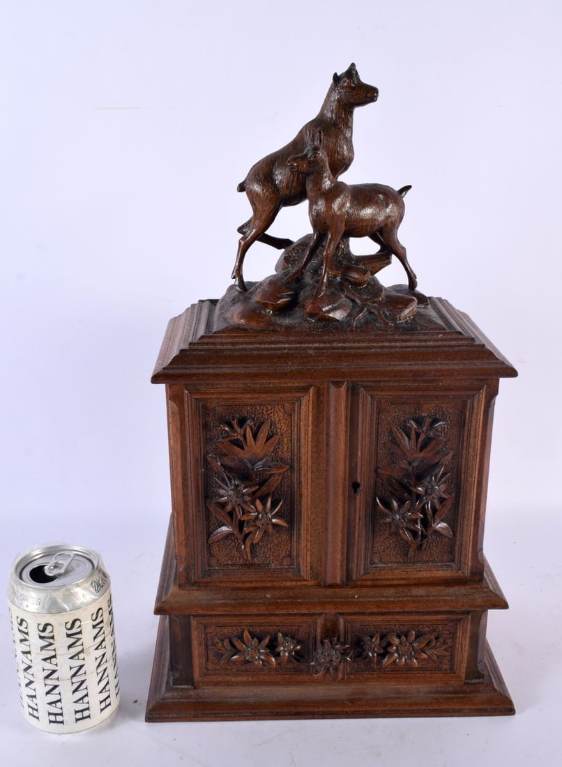 A LARGE 19TH CENTURY BAVARIAN BLACK FOREST CARVED WOOD JEWELLERY CABINET formed with two ibex. 40 cm (1 of 5)