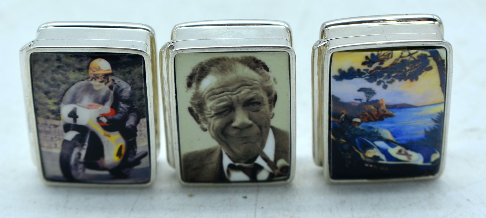 THREE SILVER PILL BOXES. Stamped 925 and Sterling, 3.2 cm x 2.6 cm x 1.3cm, total weight 60.3g (3): THREE SILVER PILL BOXES. Stamped 925 and Sterling, 3.2 cm x 2.6 cm x 1.3cm, total weight 60.3g (3)