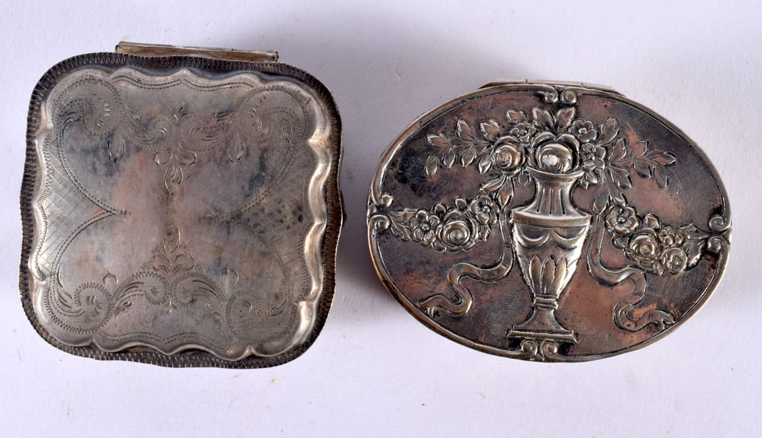 TWO EMBOSSED CONTINENTAL SILVER PILL BOXES. Stamped Sterling & 830, Largest 6.3cm x 4.9cm x 2.2 cm,: TWO EMBOSSED CONTINENTAL SILVER PILL BOXES. Stamped Sterling & 830, Largest 6.3cm x 4.9cm x 2.2 cm, total weight 88.4g (2)