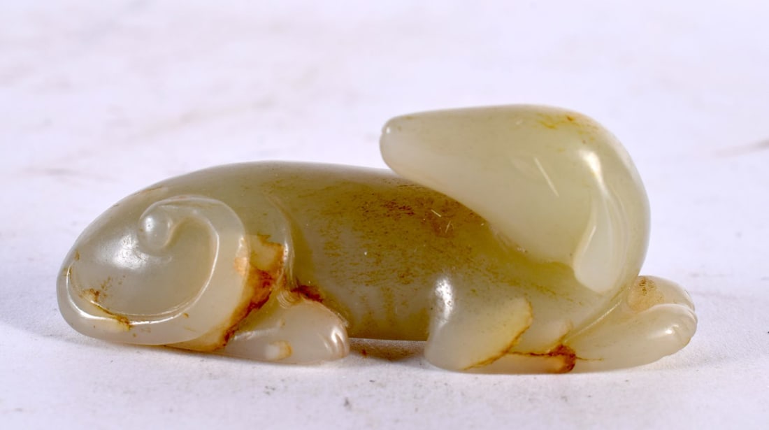 A SMALL 19TH CENTURY CHINESE CARVED GREEN JADE FIGURE OF A DOG Qing. 5.25 cm wide. (1 of 4)