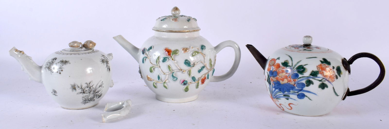THREE 18TH CENTURY CHINESE EXPORT TEAPOTS AND COVERS Qianlong. Largest 18cm wide. (3) (1 of 7)