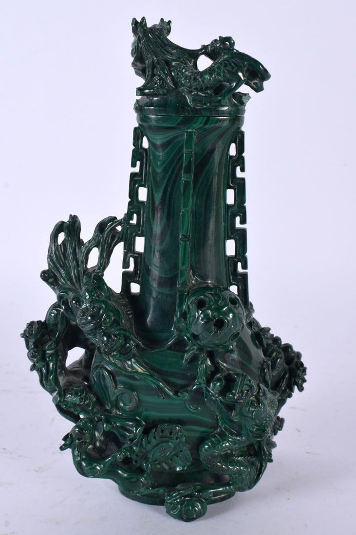 A 19TH CENTURY CHINESE CARVED MALACHITE VASE AND COVER Qing, formed with dragons pursuing a flaming (1 of 6)