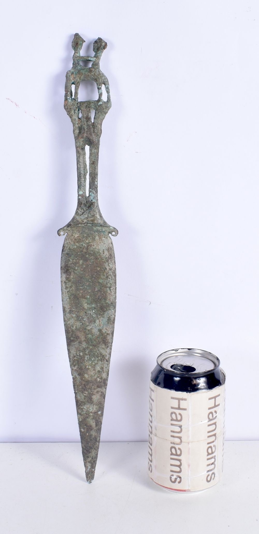 A Central Asian bronze dagger, the handle formed as two males. 39 sm. (1 of 4)