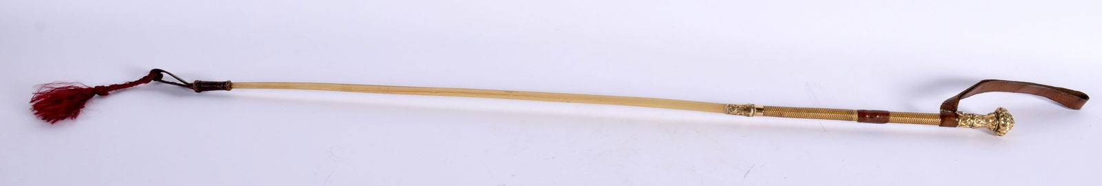 A 19TH CENTURY CONTINENTAL CARVED RHINOCEROS HORN SWAGGER STICK with yellow metal mounts. 42 grams. (1 of 6)