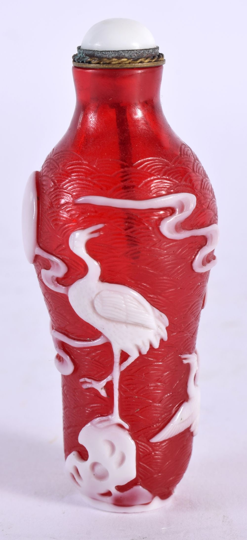 A 19TH CENTURY CHINESE CARVED PEKING GLASS SNUFF BOTTLE AND STOPPER decorated with birds and clouds. (1 of 5)