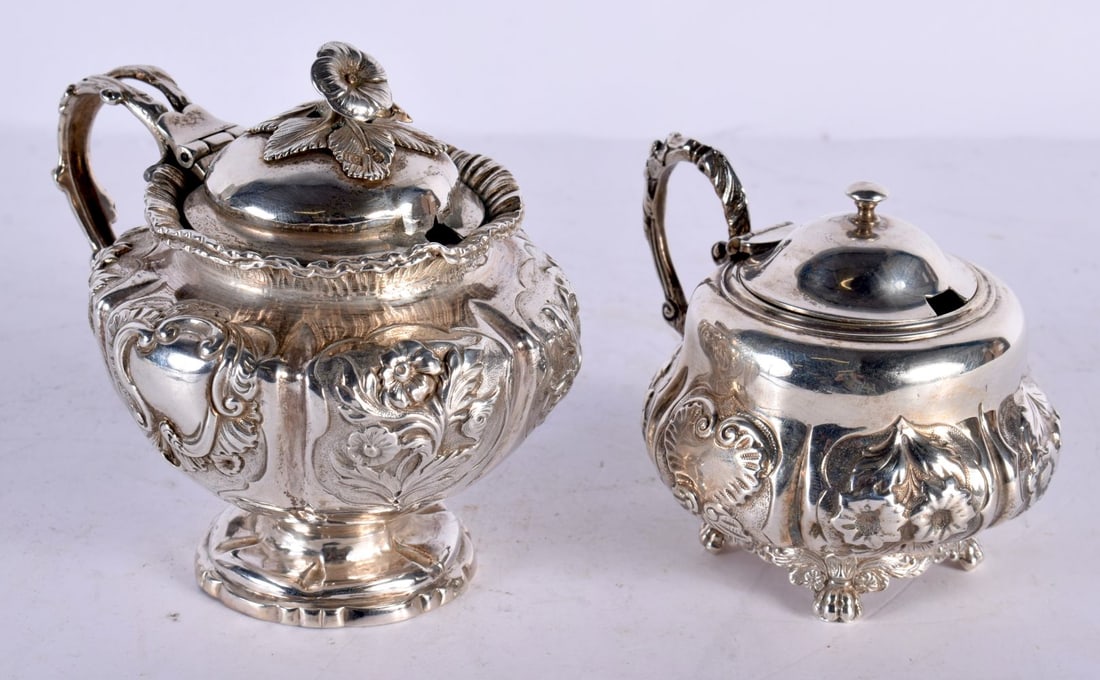 TWO MID 19TH CENTURY ENGLISH REPOUSSE MUSTARD POTS. London 1835 & 1854. 336 grams. Largest 11.5 cm x (1 of 4)