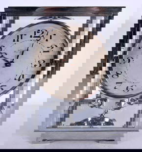A RARE 1970S JAEGER LE COLOUTRE CHROME ATMOS CLOCK possibly designed by Luigi Colani, No 3887, with: A RARE 1970S JAEGER LE COLOUTRE CHROME ATMOS CLOCK possibly designed by Luigi Colani, No 3887, with four visible viewing panels, circular dial and black numerals. 23 cm x 16 cm. Note: Thanks to a revo